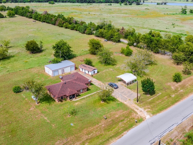 birds eye view of property featuring a rural view