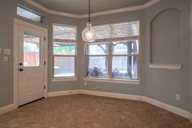 unfurnished dining area with ornamental molding