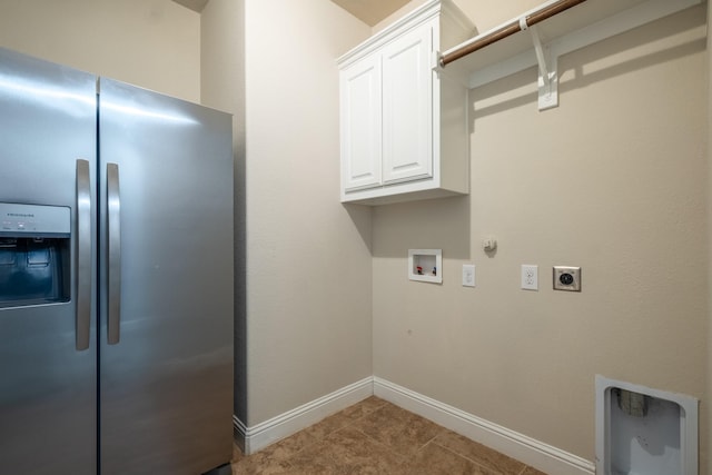 clothes washing area with gas dryer hookup, hookup for a washing machine, light tile patterned flooring, hookup for an electric dryer, and cabinets