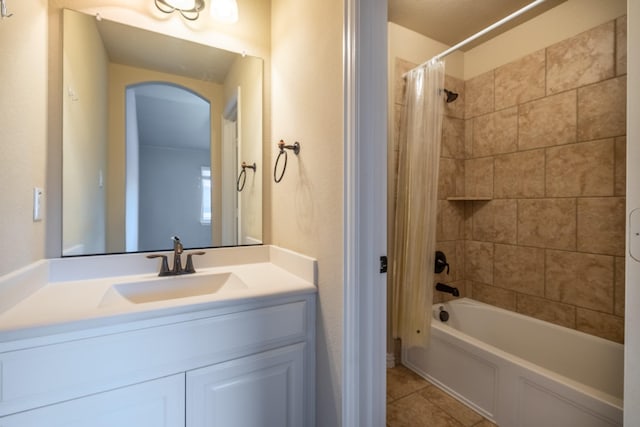 bathroom with vanity, shower / tub combo, and tile patterned floors