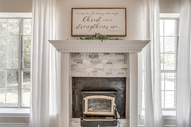 interior details featuring a wood stove