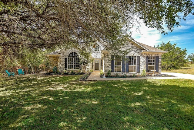 view of front of home with a front yard