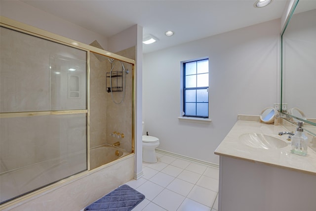 full bathroom featuring tile patterned flooring, vanity, toilet, and enclosed tub / shower combo