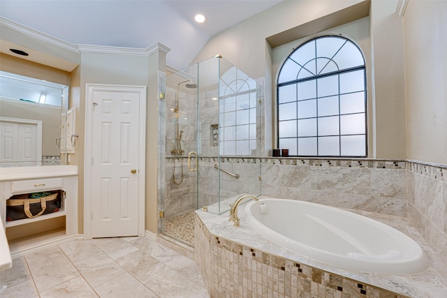 bathroom with shower with separate bathtub, vaulted ceiling, and crown molding