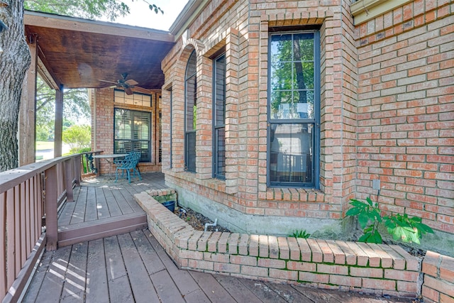 wooden terrace with ceiling fan