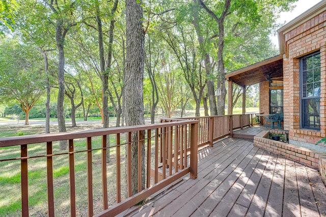 wooden terrace with ceiling fan