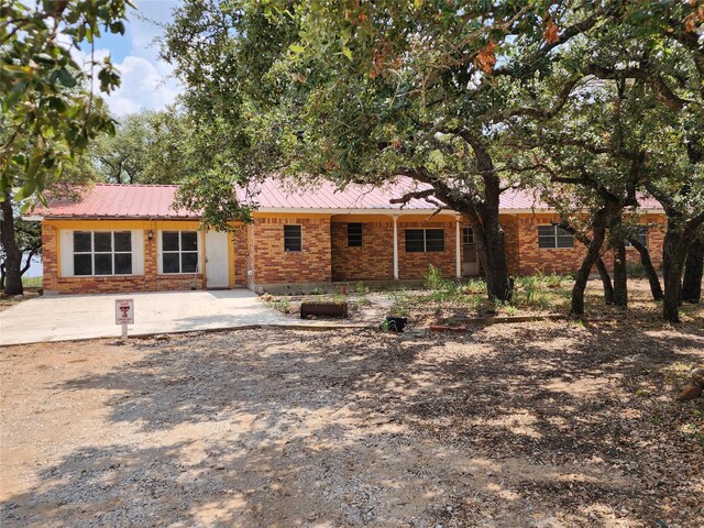 rear view of house with a patio