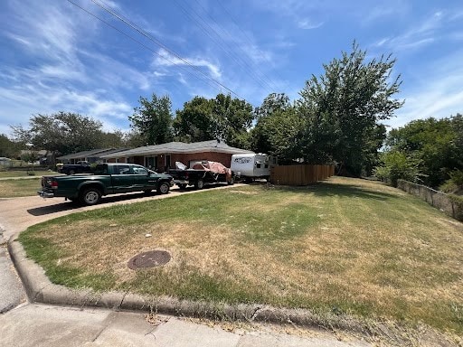 view of front of property with a front lawn