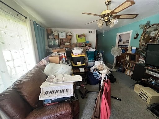 miscellaneous room featuring carpet floors and ceiling fan