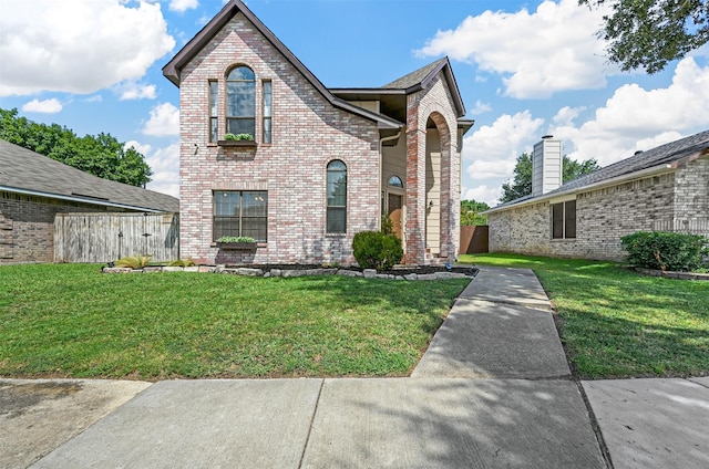 view of front facade featuring a front yard