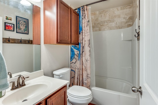 full bathroom with vanity, toilet, and shower / tub combo