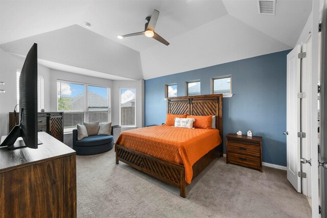 bedroom featuring vaulted ceiling, ceiling fan, and light colored carpet