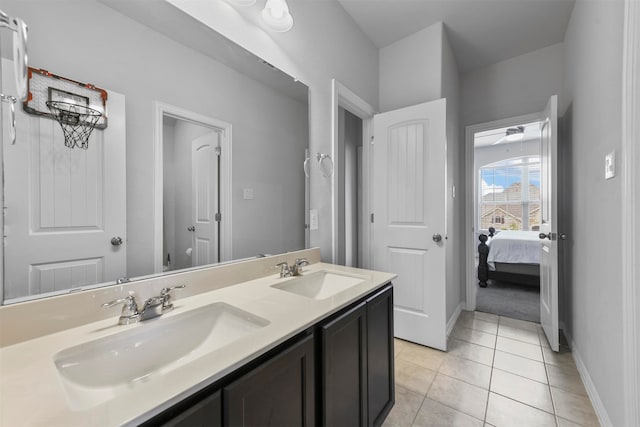 bathroom featuring double sink vanity and tile patterned floors