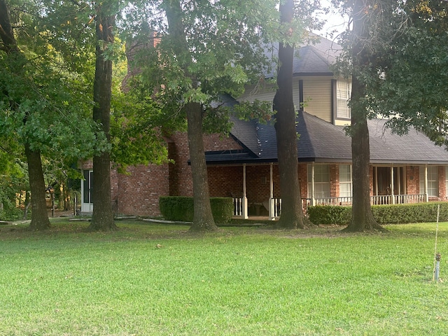 exterior space featuring a lawn