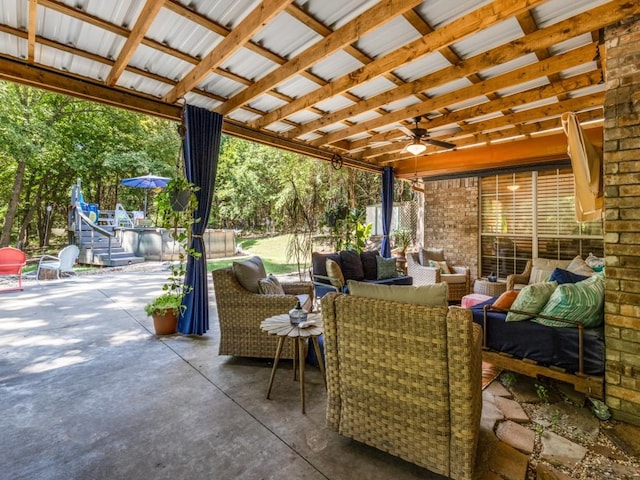 view of patio / terrace featuring an outdoor living space and ceiling fan