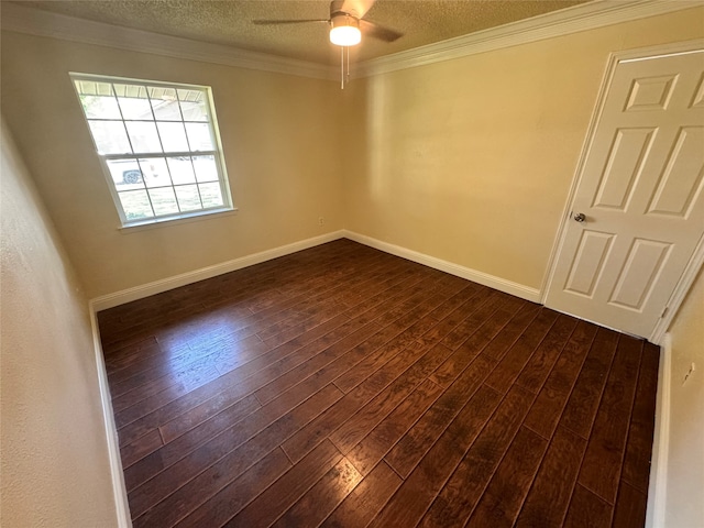 empty room featuring ceiling fan, ornamental molding, a textured ceiling, and wood-type flooring