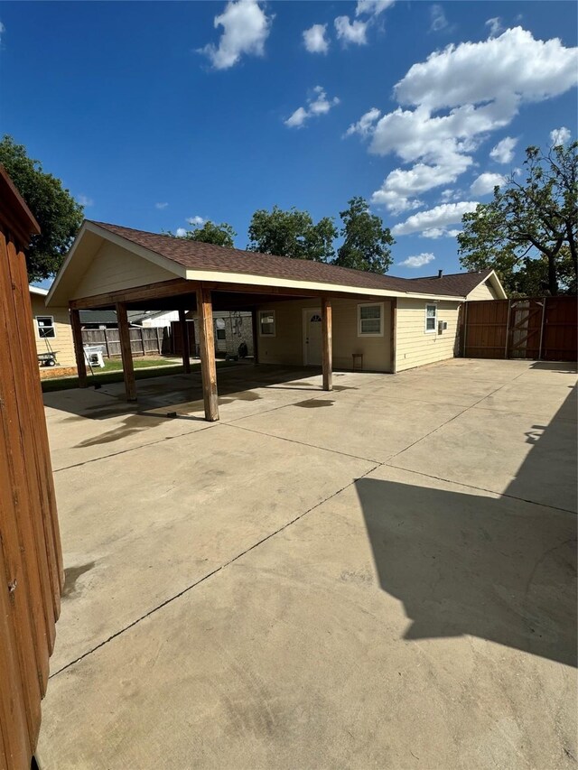 view of side of home with a patio