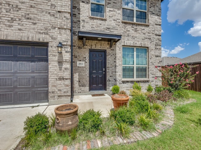 entrance to property with a garage