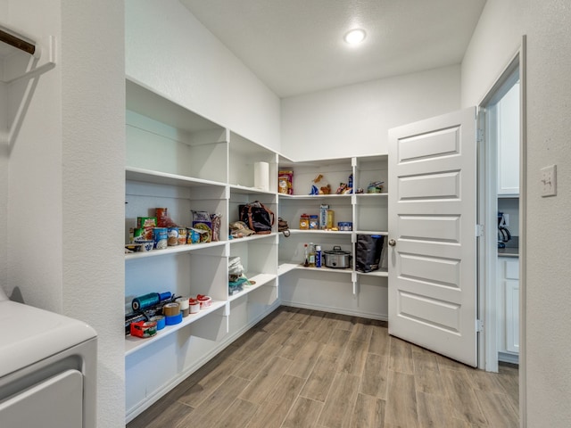 pantry featuring washer / clothes dryer