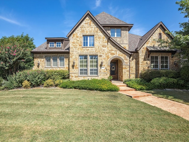 view of front of house with a front lawn