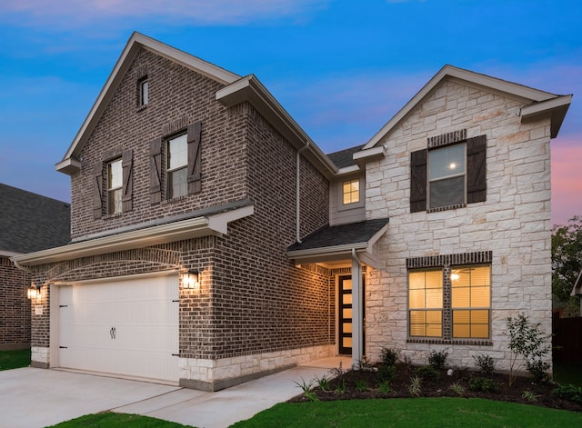 view of front of home featuring a garage