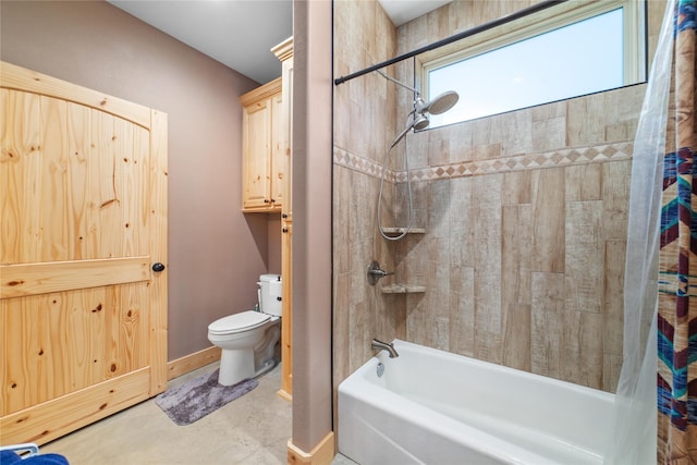 bathroom with baseboards, toilet, and shower / bath combination with curtain