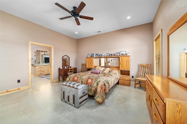 bedroom with visible vents, ensuite bathroom, recessed lighting, concrete floors, and baseboards