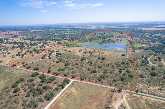 bird's eye view featuring a water view and a rural view