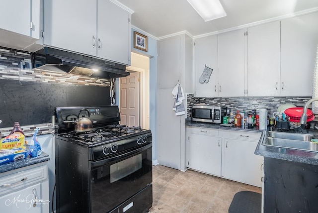 kitchen featuring crown molding, black gas range, sink, backsplash, and white cabinetry