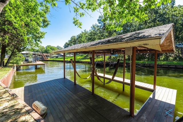 view of dock featuring a water view