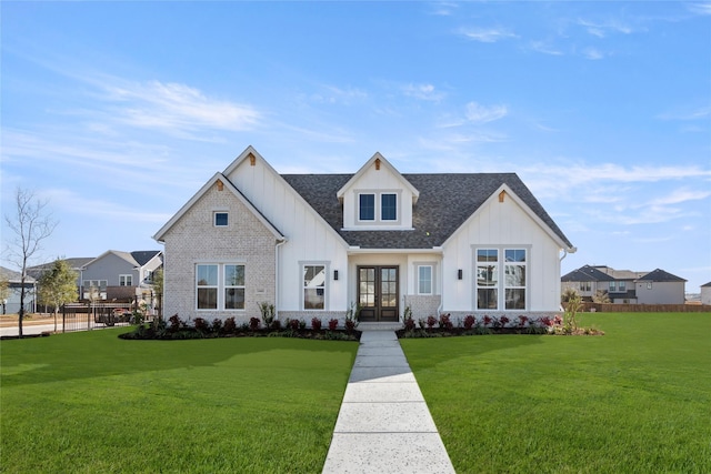 modern inspired farmhouse with french doors and a front lawn