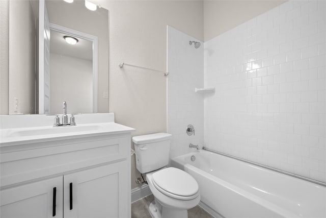 full bathroom featuring toilet, vanity, and tiled shower / bath combo