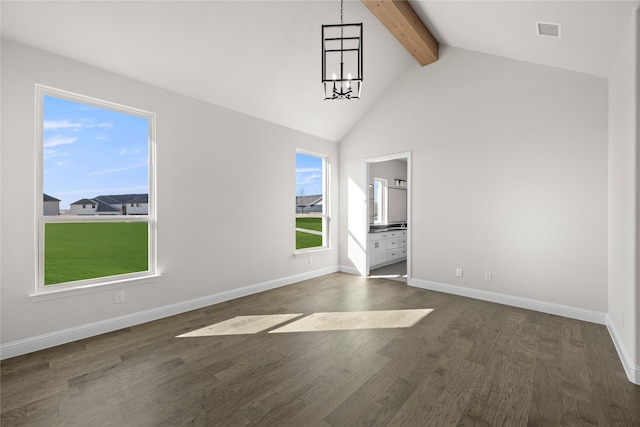 interior space with an inviting chandelier, lofted ceiling with beams, and dark hardwood / wood-style flooring