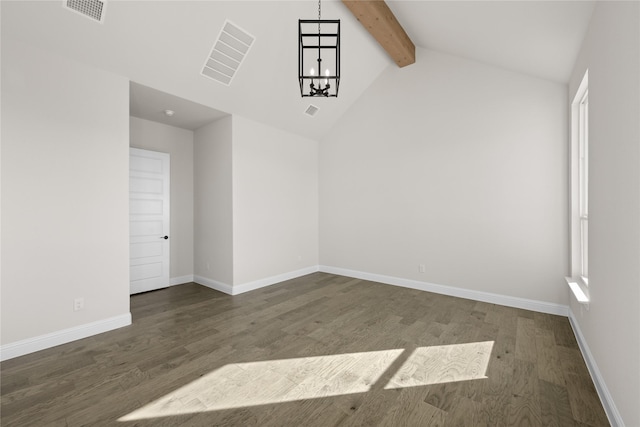 empty room featuring lofted ceiling with beams, a notable chandelier, and dark wood-type flooring