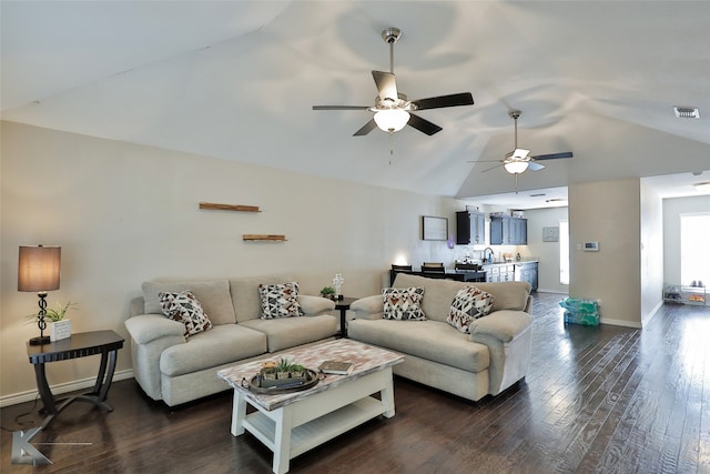 living room with lofted ceiling, ceiling fan, dark hardwood / wood-style floors, and sink