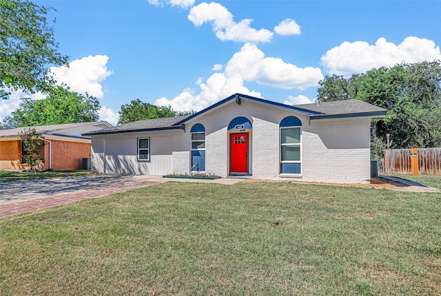 single story home with a front yard and cooling unit