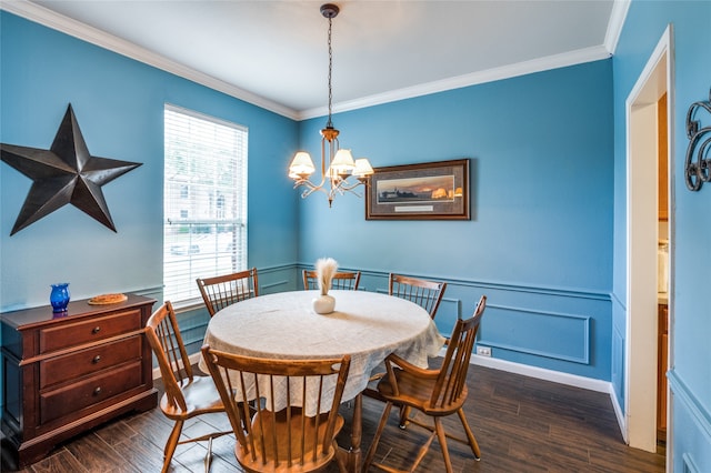 dining space with crown molding, dark hardwood / wood-style flooring, and a notable chandelier