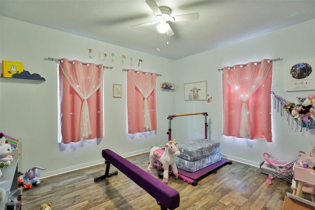 bedroom featuring ceiling fan and hardwood / wood-style floors