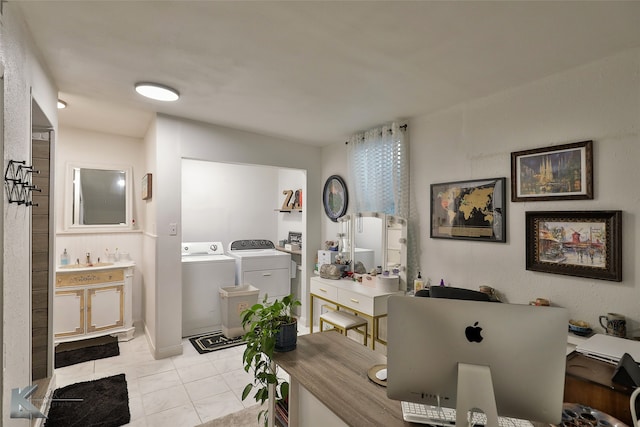 bathroom featuring vanity, independent washer and dryer, and tile patterned floors