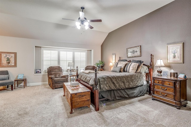 bedroom featuring ceiling fan, vaulted ceiling, and light colored carpet