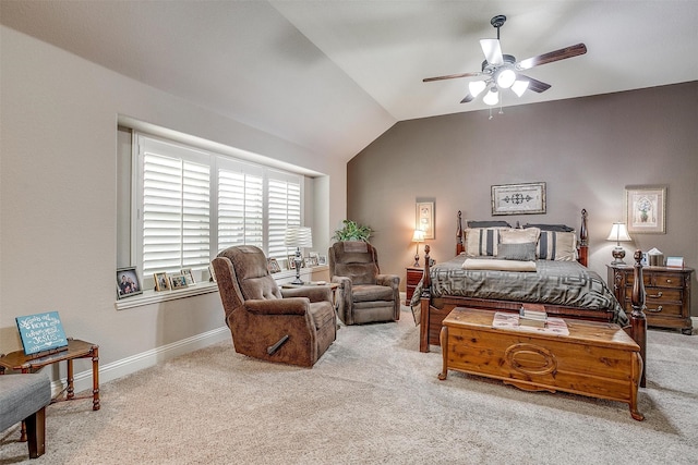 bedroom with ceiling fan, light colored carpet, and lofted ceiling