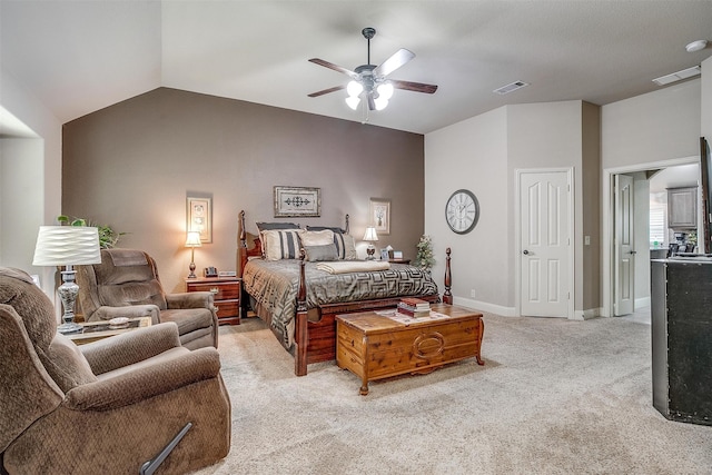 bedroom featuring ceiling fan, vaulted ceiling, and light carpet