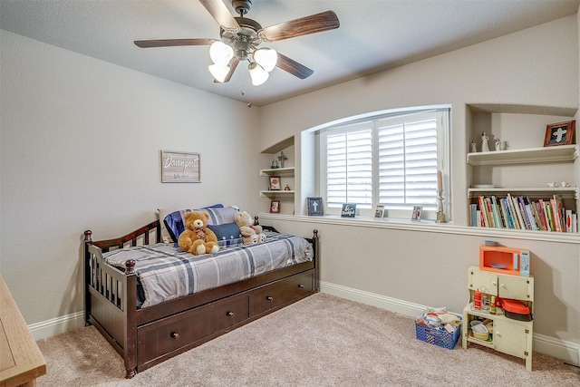 carpeted bedroom featuring ceiling fan