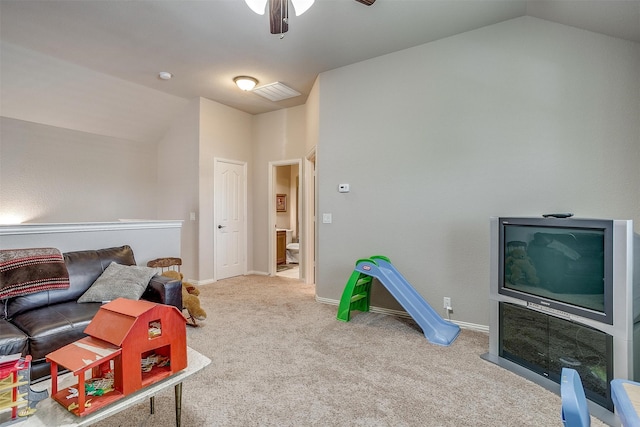 game room with ceiling fan, carpet floors, and lofted ceiling