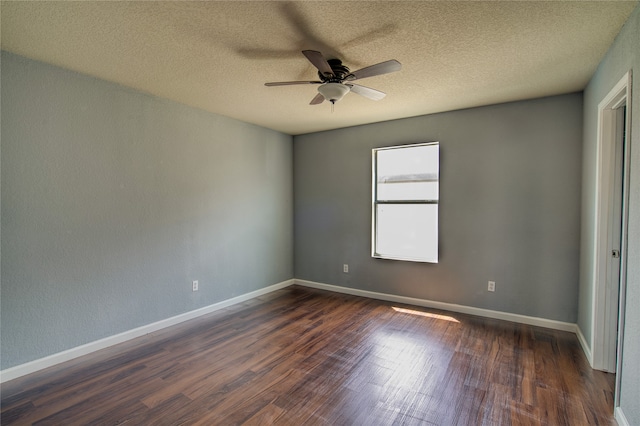 empty room with a textured ceiling, ceiling fan, and hardwood / wood-style floors