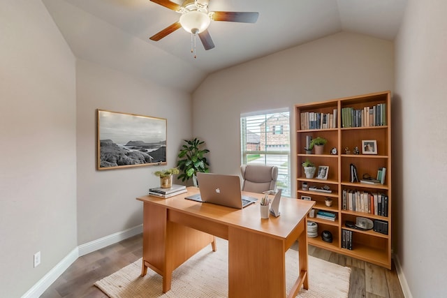 office featuring ceiling fan, light hardwood / wood-style floors, and lofted ceiling