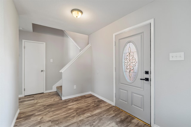 foyer with hardwood / wood-style flooring