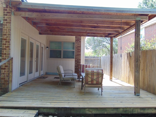 wooden terrace featuring french doors