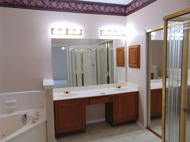 bathroom featuring vanity and separate shower and tub