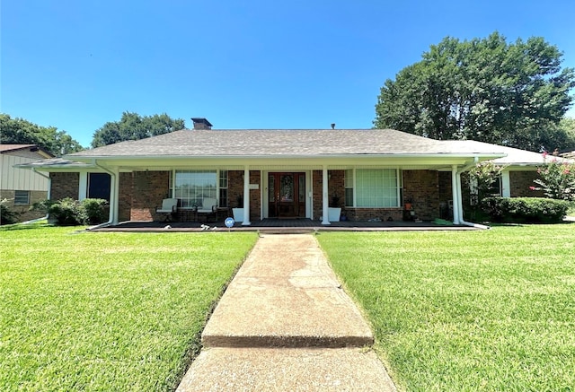 ranch-style home with a front yard